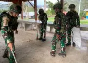 Satgas Yonif 521/DY dan Warga Gotong Royong Bersihkan Pasar Bolakme, Wujudkan Lingkungan Sehat dan Nyaman