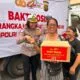 Sambut Hari Bhayangkara ke-80, Polda Bali Bagikan 300 Paket Sembako kepada Buruh Angkut di Pasar Kumbasari